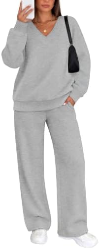 A pale heather grey two-piece set cut with a ribbed V-neck pullover and easy wide-leg pants for travel days and cool weather lounging.