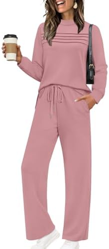 A soft pink two-piece set cut from drapey spacer fabric with a pleated-front top and cropped wide-leg pants.