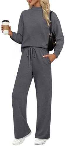 A spacer knit two-piece set in charcoal dark grey, cut with a clean mock neck top and breezy wide-leg sweatpants.