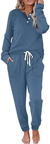 A muted steel blue lounge set in lightweight thermal fleece, paired with a buttoned henley top and deep side pockets.