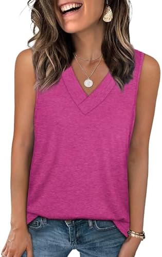 A bright pink knit tank cut loose through the waist with a sharp V-neckline that pairs easily with denim shorts.