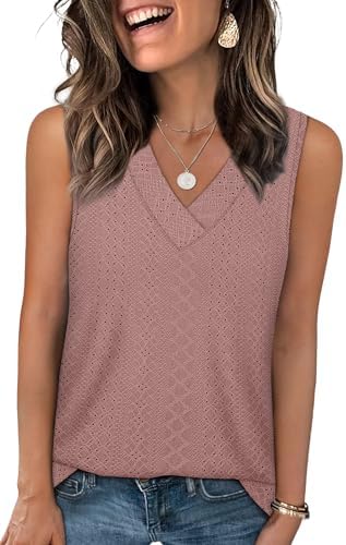 A soft V-neckline leads into a relaxed drape in dusty pink, cut with eyelet detail to keep warm days cool.