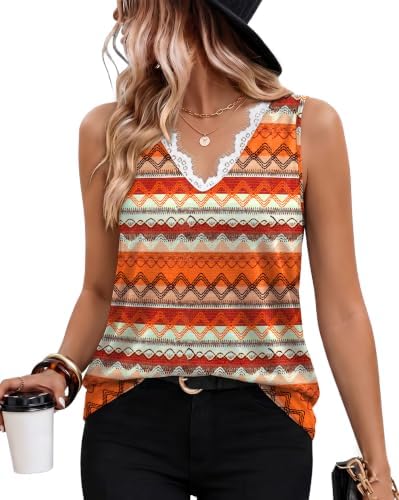 A breezy lace V-neck tank patterned in warm orange boho florals, cut loose through the body with a flowy curved hem.