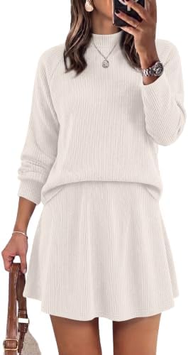 Crisp white knit pairs a mock neck top with an A-line skirt, giving you two soft separates ready for work or weekend travel.