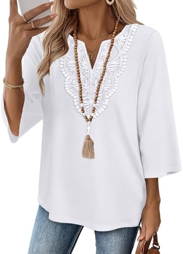Lace detailing at the neckline brings quiet texture to this lightweight tunic with three-quarter sleeves and a curved hem.