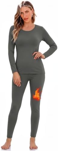 A heathered grey base layer set lined in plush fleece keeps winter drafts away while layering smoothly under outdoor gear.