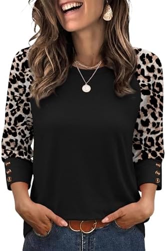 Raglan sleeves in black leopard print join a solid bodice on this soft, curved-hem baseball tee finished with decorative buttons.