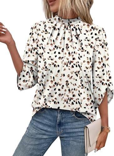 Tiny polka dots and a pleated mock neck give this fluid stretch top a crisp graphic look that works under jackets or on its own.