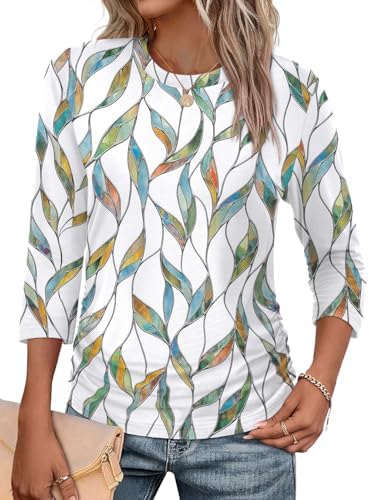 Soft botanical patterning and side ruching give this three-quarter sleeve top an easy drape for warm afternoons.