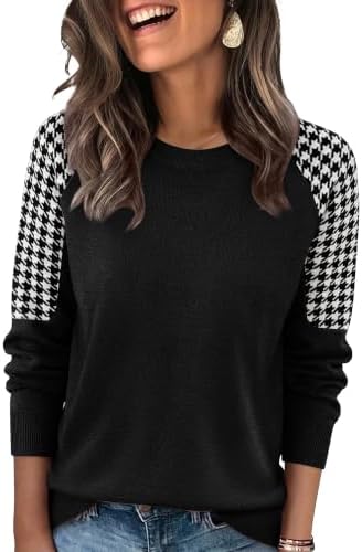 Black knit through the body meets crisp houndstooth jacquard across the raglan sleeves on this lightweight crewneck top.