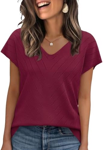 A deep wine red knit top with cap sleeves and a gentle V-neck, ready for office hours or holiday travel.