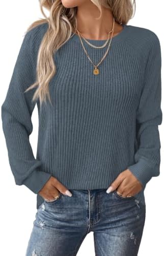 A ribbed knit pullover in fresh green and blue tones, cut with raglan sleeves and soft contrast ribbing at the neck and cuffs.