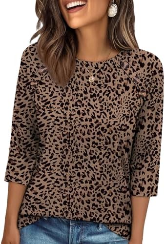 Tonal leopard print covers this loose crewneck top, finished with three-quarter sleeves and neat decorative button accents.