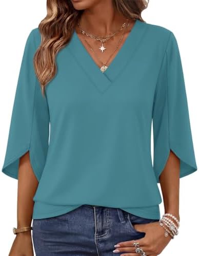 Split three-quarter sleeves and a bright turquoise shade make this easy summer pullover ready for work days and weekend travel.