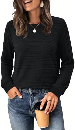 A plush black knit that feels like a chenille blanket, cut in a relaxed shape for easy autumn layering.