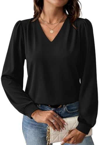 A deep black long sleeve top cut with subtle shoulder pleats and a clean V neckline for crisp workday layering.