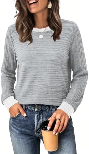 Soft chenille-like texture and cool grey color blocking make this long sleeve top an easy layer for breezy mornings.
