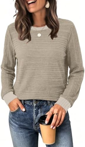 A soft color-block knit in warm khaki tones, cut with long sleeves and a relaxed fit for easy layering.