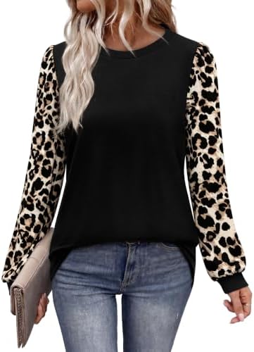 Bold leopard sleeves contrast with a solid black bodice on this easy tunic cut for cool fall days and winter layering.