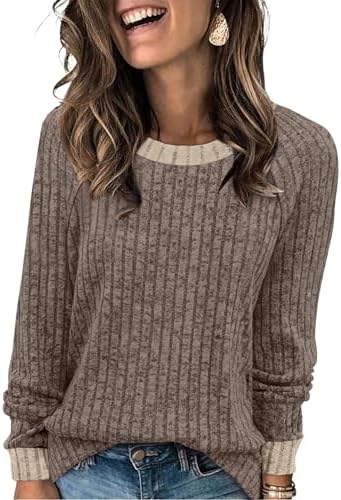 A plush color block round neck tunic woven in blanket-soft knit with plenty of ease through the waist.