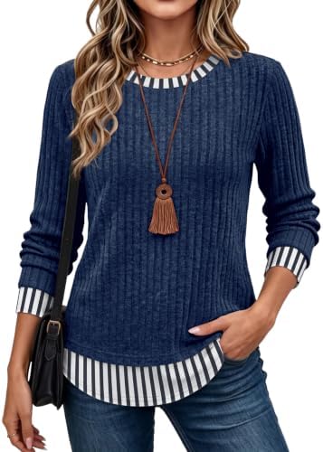 Crisp blue stripes and an attached contrast hem give this soft knit tunic the clean look of two pieces in one easy layer.