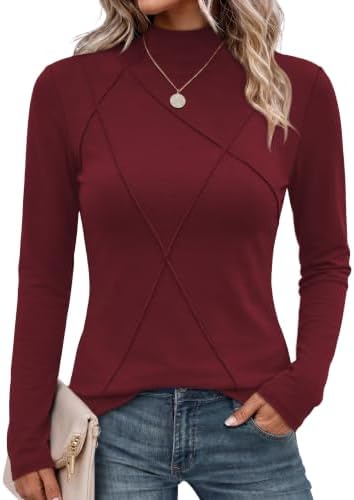 A deep wine red mock neck top cut close to the body in a stretchy knit with clean vertical front seam detailing.