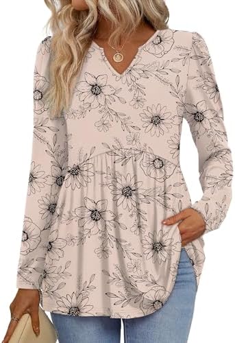 Gentle floral sprigs over a warm beige ground bring soft pattern to this loose, tiered babydoll long sleeve top.
