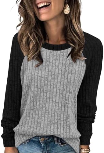 Crisp black and heather grey panels split this soft crewneck sweater, cut relaxed for easy autumn layering.