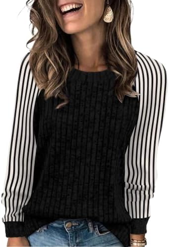 Crisp black and white colorblocking turns this plush, lightweight knit into an easy layer for workdays or casual weekends.