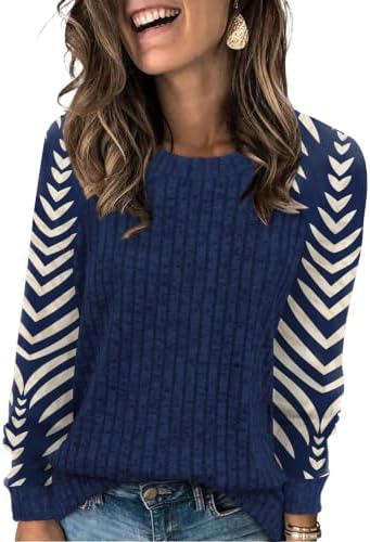 Color-blocked blue and warm apricot panels give this plush, lightweight crewneck sweater an easy balance for breezy days.