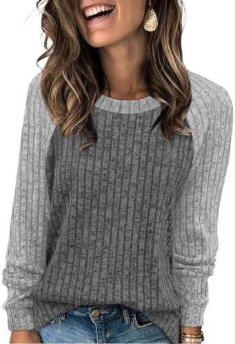 Heathered grey meets crisp white panels on a soft, lightweight knit with the plush texture of a blanket.