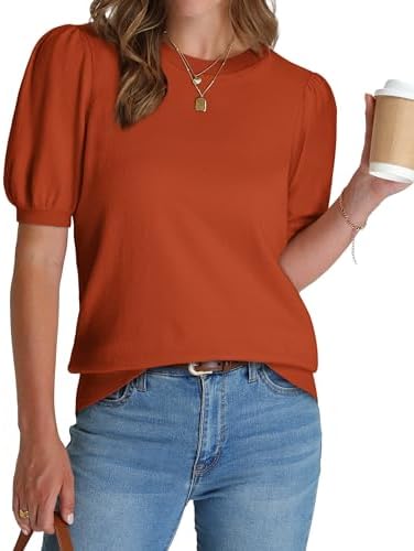 A vivid orange fine-gauge knit top detailed with gentle puff sleeves and a tidy ribbed hem band for warm afternoons.