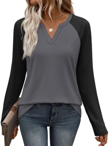 Raglan sleeves and deep dark grey color blocking give this relaxed long sleeve knit a grounded, casual look for cool days.