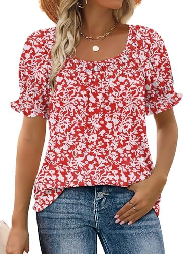 A red and white floral print covers this light summer blouse with smocked ruffle sleeves and an airy drape through the waist.