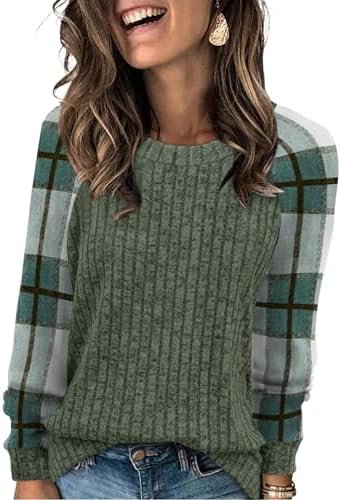Plush green plaid panels accent this long sleeve knit tunic for an easy layer on cool travel days.