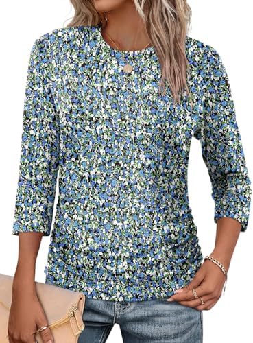 A soft floral blue print pairs with three-quarter sleeves and gentle side ruching for warm days and cool breeze.