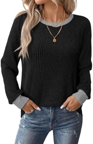 A deep black vertical rib knit gives this lightweight long sleeve top a soft texture that easily transitions into cooler evenings.
