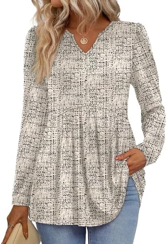 A soft babydoll top cut with an empire waist, gentle puff sleeves, and a classic V-neckline in a patterned beige knit.