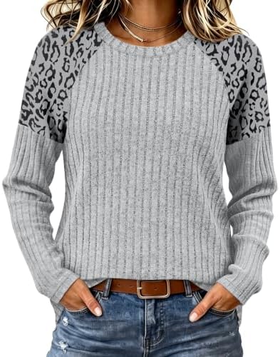 A soft light grey knit body joins matching leopard print raglan sleeves for an easy layer with gentle warmth.