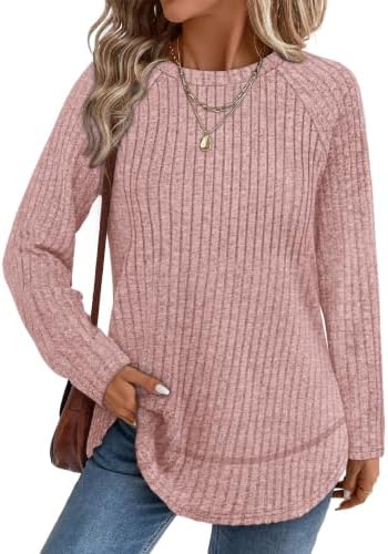 A soft pink ribbed tunic with a curved high-low hem and side slits gives you easy coverage for brisk fall mornings and cool nights.