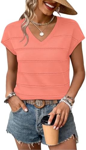 Airy hollow-out knitwork meets a warm coral shade in this breezy cap-sleeve sweater made for sunlit afternoons.