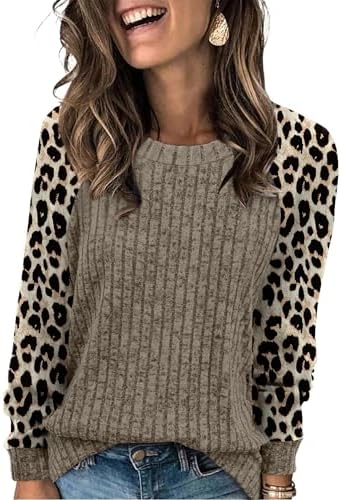 Warm apricot leopard print meets color-block detailing on a soft, lightweight knit sweater cut with an easy loose silhouette.