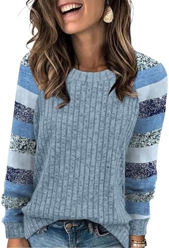 Cool sky blue stripes break across this lightweight knit tunic, cut long and relaxed for breezy evenings and travel days.