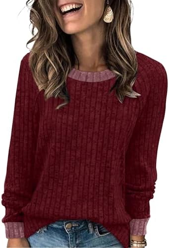A blanket-soft red knit tunic with contrast color blocking gives you an easy layer for travel days and cool evenings.