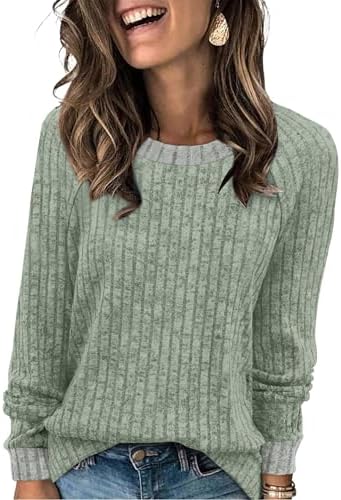 A soft light green color block sweater knit with a blanket-like hand, cut loose for travel days and casual offices.