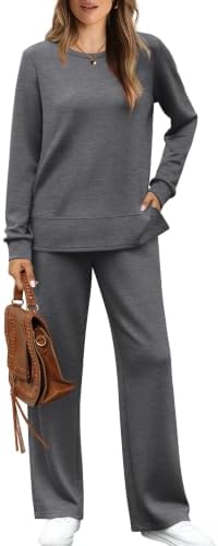 A relaxed dark grey two-piece set pairing a crewneck long sleeve top with wide leg drawstring sweatpants and pockets.