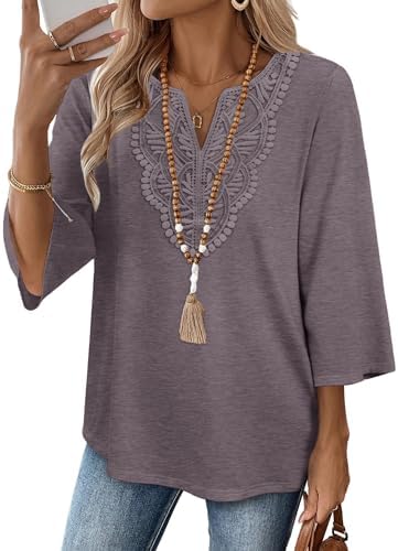 Lace detailing along the V-neck pairs with comfortable three-quarter sleeves and a curved tunic hem for easy everyday wear.