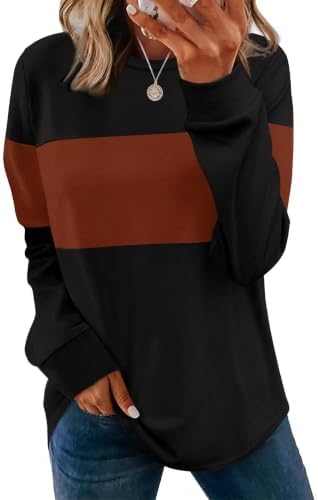 A rich caramel tunic sweatshirt cut with long sleeves, side slits, and a curved hem that sits well over leggings.
