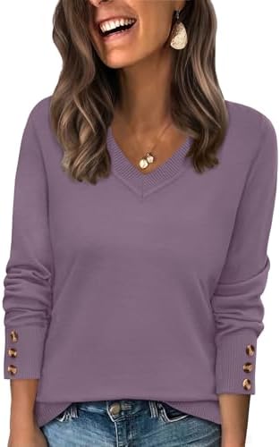 Muted grey purple sets a quiet, polished mood on this relaxed tunic sweater with a wide open collar and button cuffs.