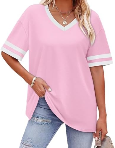 Soft pink jersey pairs with sporty striped sleeve bands for an easy tunic top that drapes loosely through the hem.